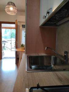 A kitchen or kitchenette at Piccolo Appartamento Casa Vacanze B&B Angela