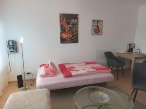 Ένα ή περισσότερα κρεβάτια σε δωμάτιο στο Apartment-Ferienwohnung in Mainaschaff +14 φωτογραφίες