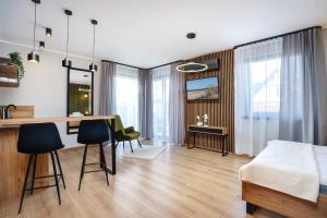 Apartamenty i Pokoje Złote Piaski客房内的一张或多张床位