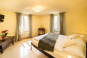 Postel nebo postele na pokoji v ubytování Locanda Villa d' Epoca