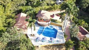 Bazén v ubytování Hotel campestre los Arrieros nebo v jeho okolí