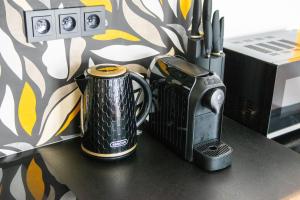 Kemudahan buat kopi dan teh di Luxusní Apartmán NMNM Essence