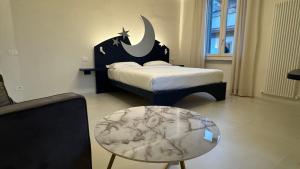 Postel nebo postele na pokoji v ubytování Sette Note Guest House