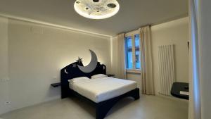Postel nebo postele na pokoji v ubytování Sette Note Guest House
