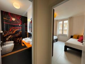 Postel nebo postele na pokoji v ubytování Sette Note Guest House