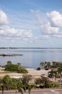 a view of a large body of water with a pier at Sunseeker Resort Charlotte Harbor in Port Charlotte