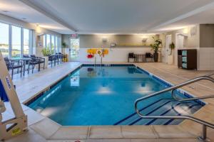 a large swimming pool in a hotel room at TownePlace Suites by Marriott Chesterfield in Chesterfield