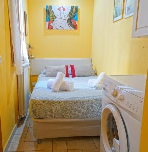 Katil atau katil-katil dalam bilik di Gest Short Rent Siena 1