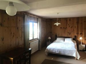 Säng eller sängar i ett rum på Chalet Chamois - Chalets pour 10 Personnes 214