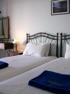 Postel nebo postele na pokoji v ubytování Anniska Hotel