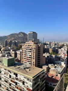 a view of a city with buildings at AMISTAR BELLAS ARTES in Santiago