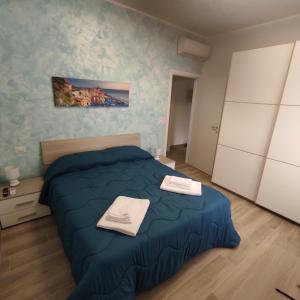 Postel nebo postele na pokoji v ubytování Onda Marina 2