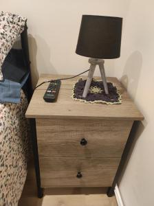 TV a/nebo společenská místnost v ubytování Chez Dori Chambre privée