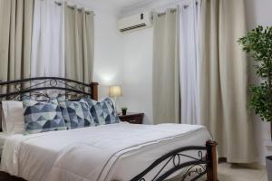 Postel nebo postele na pokoji v ubytování J. B Apartamentos