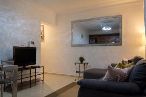 TV a/nebo společenská místnost v ubytování J. B Apartamentos