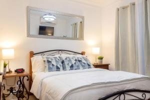 Postel nebo postele na pokoji v ubytování J. B Apartamentos