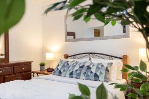 Postel nebo postele na pokoji v ubytování J. B Apartamentos