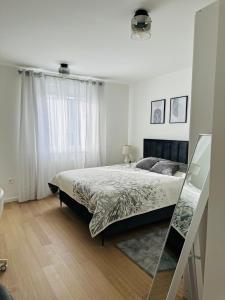 Ένα ή περισσότερα κρεβάτια σε δωμάτιο στο Le Boutique Chambre Vita