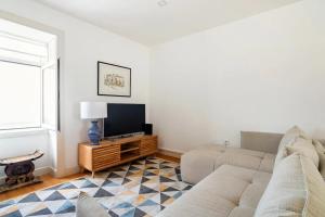 Μια τηλεόραση ή/και κέντρο ψυχαγωγίας στο Cosy house for Surf & Beach