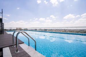 a swimming pool on the top of a building at Laurel Hill Suites in Nairobi
