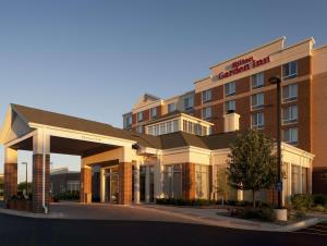 a rendering of the front of a hotel at Hilton Garden Inn Schaumburg in Schaumburg