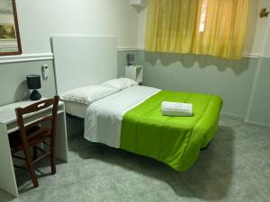 Postel nebo postele na pokoji v ubytování Hotel Alloggio Del Conte