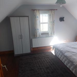 Postel nebo postele na pokoji v ubytování Kenmare