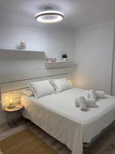 A bed or beds in a room at Vitaly Beach Még 30 kép