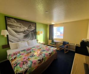 Postel nebo postele na pokoji v ubytování Horizon Hotel
