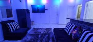 TV a/nebo společenská místnost v ubytování Sandbeach apartment