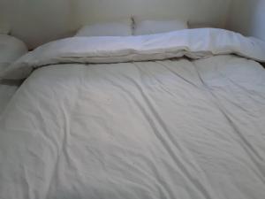 Postel nebo postele na pokoji v ubytování Guest house tassaoute