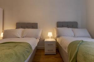 Cama o camas de una habitación en Comfy • Quiet • Your Other Home
