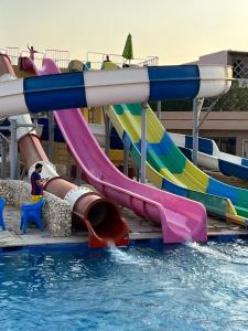 a group of slides in a water park at Nozha Beach - Ras Sudr in Ras Sedr