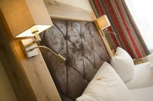 Postel nebo postele na pokoji v ubytování Hotel Gasthof Jägerhaus