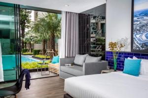 Posezení v ubytování The Crystal Hotel Buriram - formerly X2 Vibe Buriram