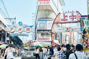 a crowd of people walking in a busy city street at NOHGA HOTEL UENO TOKYO in Tokyo