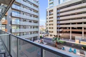 an apartment balcony with a view of a building at The Nomad Roosevelt in Phoenix