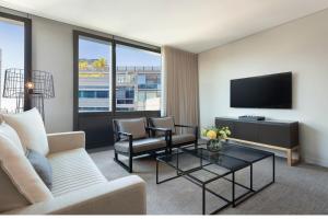 TV a/nebo společenská místnost v ubytování Four Points by Sheraton Sydney, Central Park