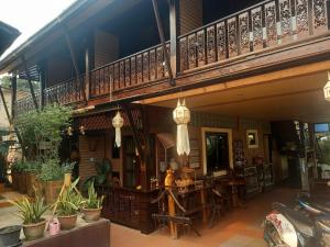Balkón nebo terasa v ubytování Baanfai Guesthouse Chiangkhong