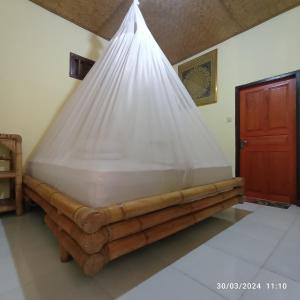Tangga Bungalows Gili Air客房内的一张或多张床位