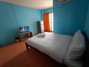 Postel nebo postele na pokoji v ubytování jw place รามคำแหง 40