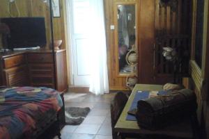 Postel nebo postele na pokoji v ubytování Villa avec vue sur mer à Vieux Habitants, piscine