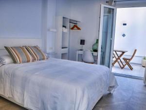 Ένα ή περισσότερα κρεβάτια σε δωμάτιο στο Apartment in Conil near Stunning Beaches