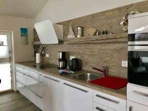 Køkken eller tekøkken på De Lütte Modern retreat + 25 billeder