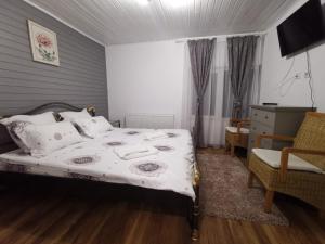 Postel nebo postele na pokoji v ubytování Casa Aurora