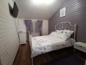 Postel nebo postele na pokoji v ubytování Casa Aurora