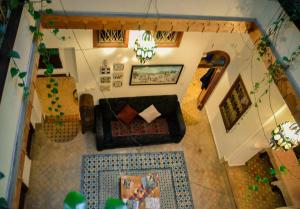 an overhead view of a living room with a couch at Dar Rehla in Tétouan