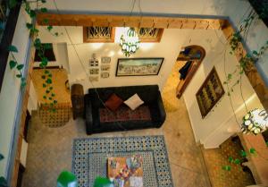 an overhead view of a living room with a couch at Dar Rehla in Tetouan