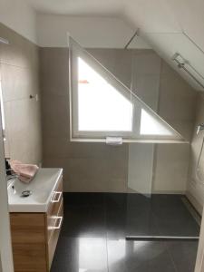 Kúpeľňa v ubytovaní Apartment Za Poštou