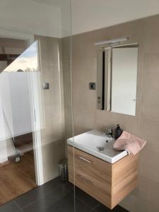 Kúpeľňa v ubytovaní Apartment Za Poštou